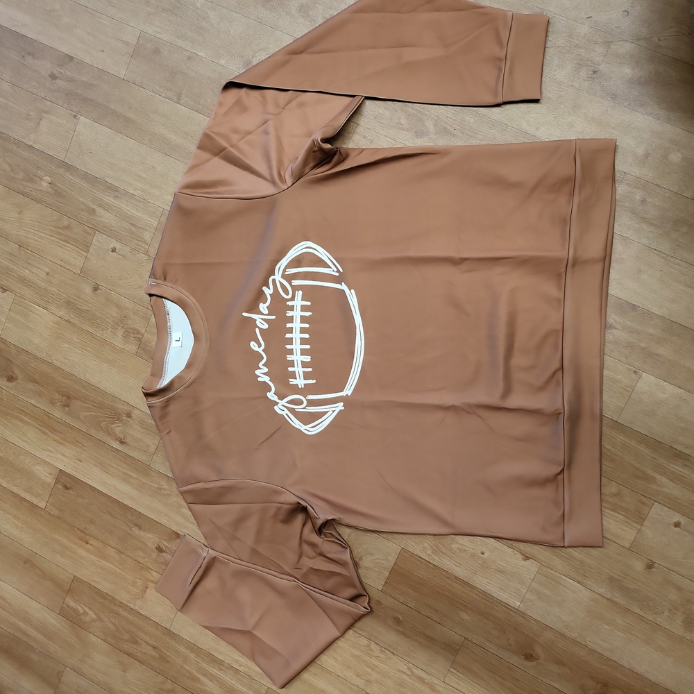Loose fitting long sleeve football tee